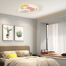 Weiche Lichtstimmung im Schlafzimmer durch rosa LED-Wolkenlampe mit indirekter Beleuchtung