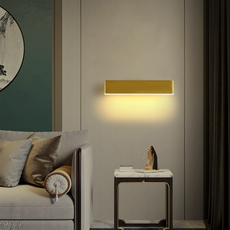 Gold Wandleuchte fürs Wohnzimmer.