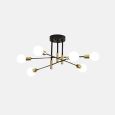 Moderne LED-Deckenleuchte in Gold als stilvoller Blickfang über dem Bett in einem gemütlich eingerichteten Schlafzimmer.