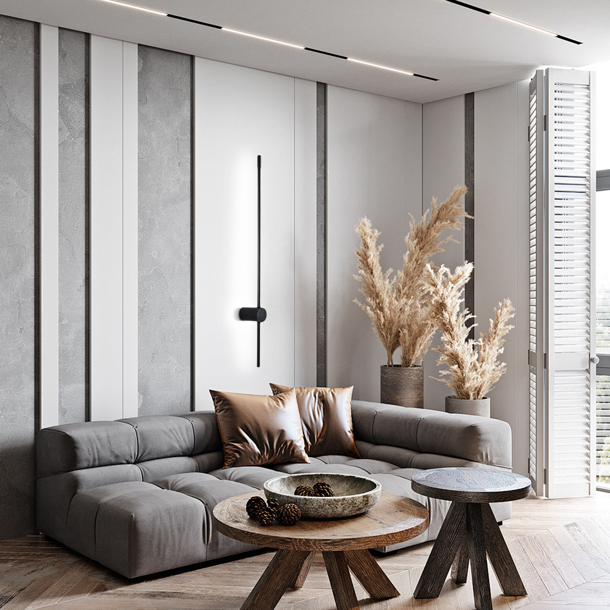 Schwarze Metallwandleuchte sorgt für stimmungsvolle Hintergrundbeleuchtung im modernen Wohnzimmer